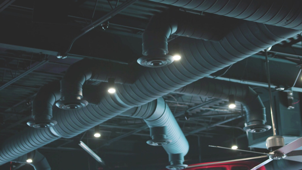 dark venue ceiling ductwork and lighting